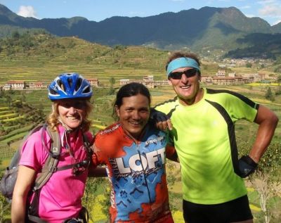 Trish and Darren Whitaker Cycling on the  tour with redspokes